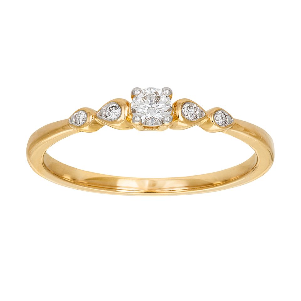 Diamantring i 18K guld med sidostenar, 15.5